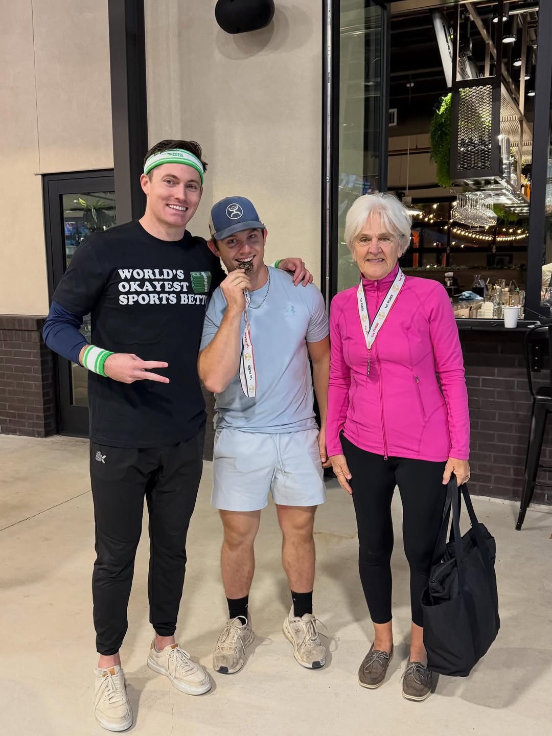 Friends celebrating with medals