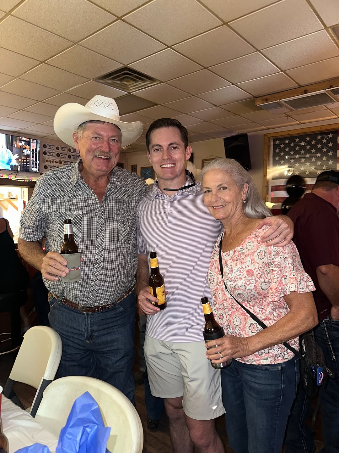 Luke with family at a table